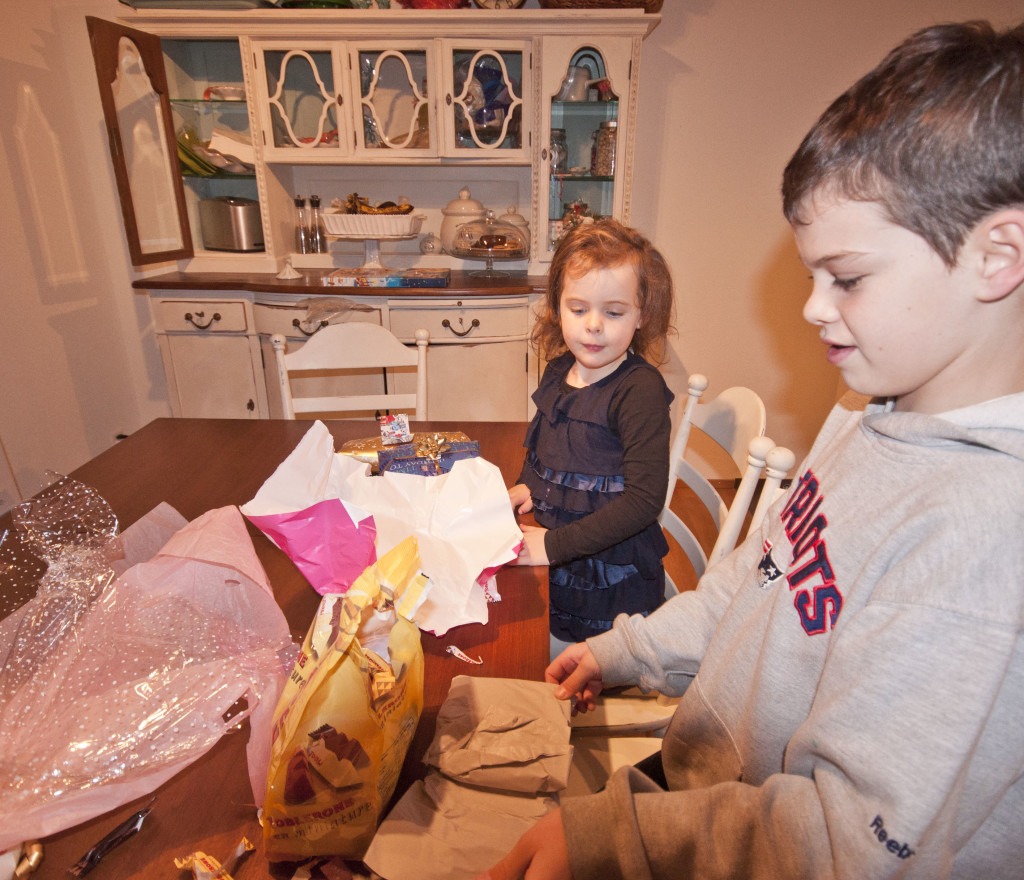kids opening gifts